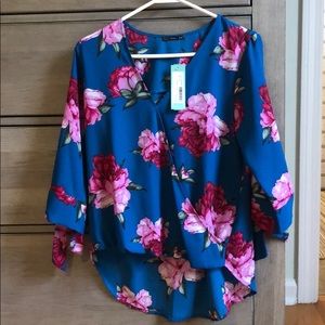 Flowered blouse.